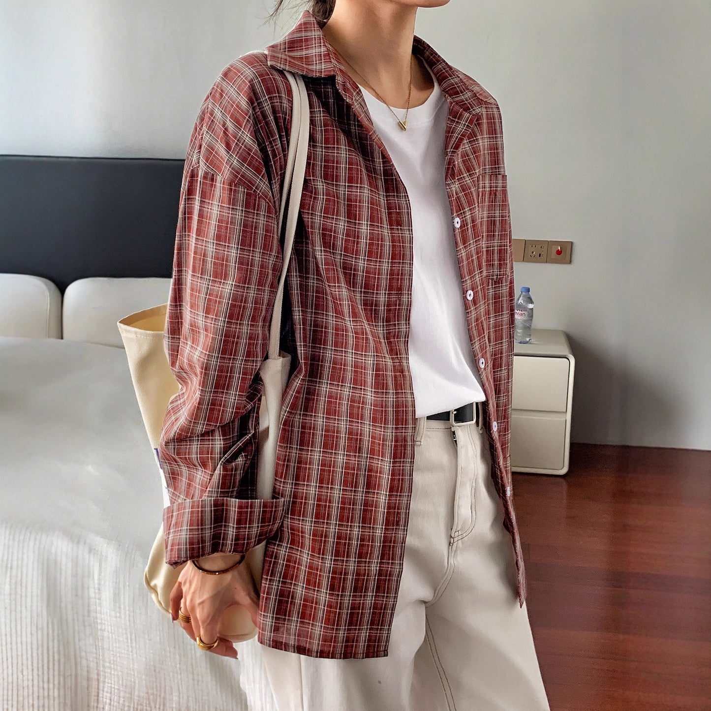 Checkered long sleeved button down shirt for women