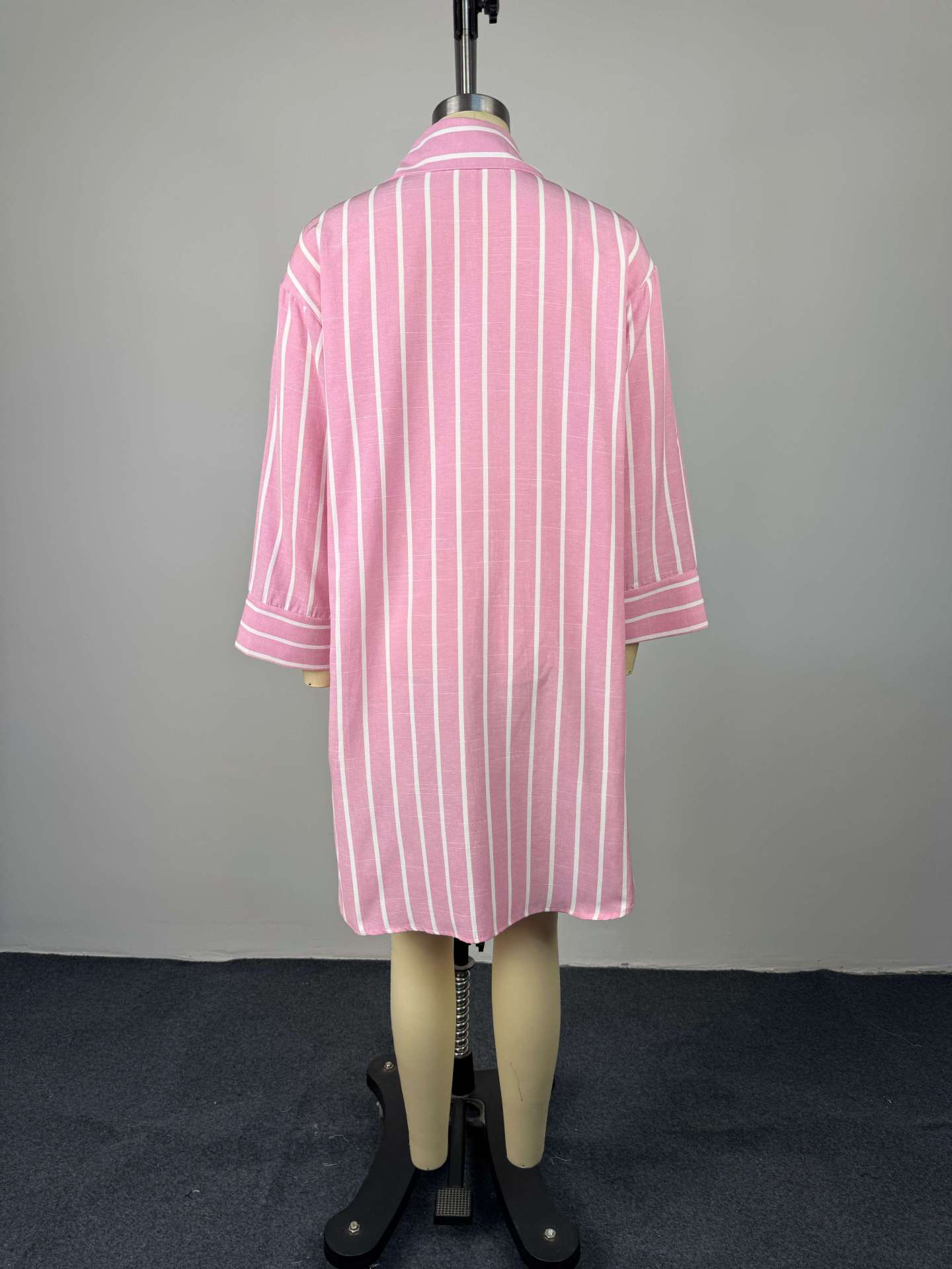 Collar breasted loose striped long sleeved mid length shirt for women