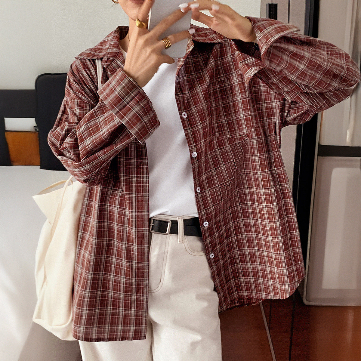 Checkered long sleeved button down shirt for women