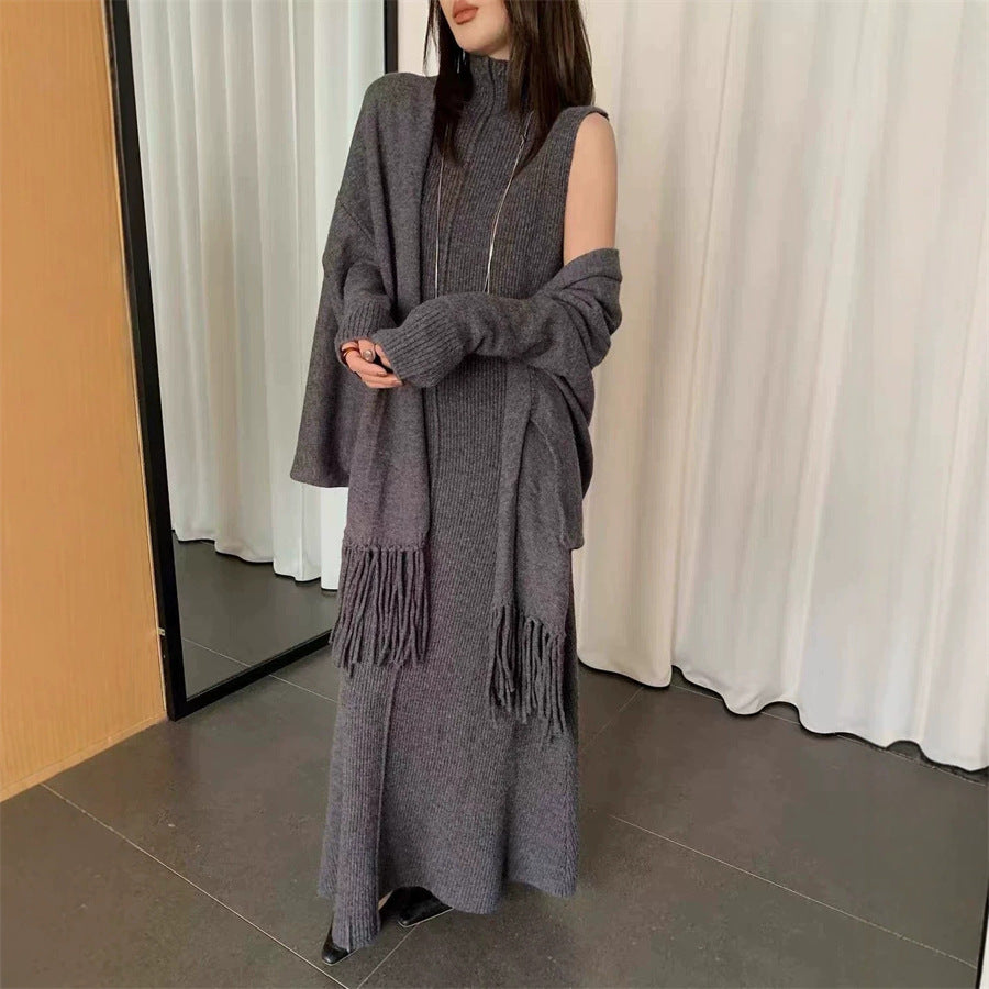 Wear a sleeveless high neck slim fitting jumpsuit long dress