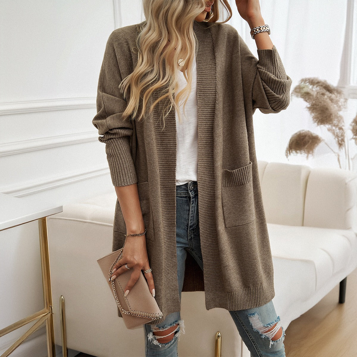 Autumn and winter European and American women's batsleeved temperament cardigan solid color sweater jacket