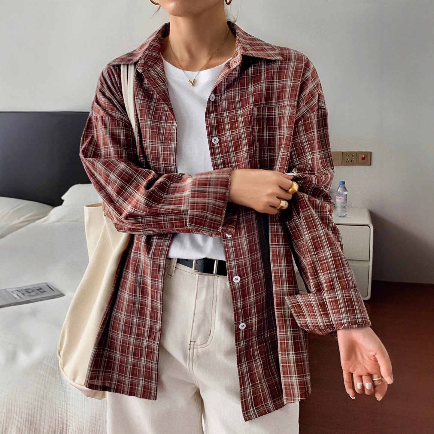 Checkered long sleeved button down shirt for women