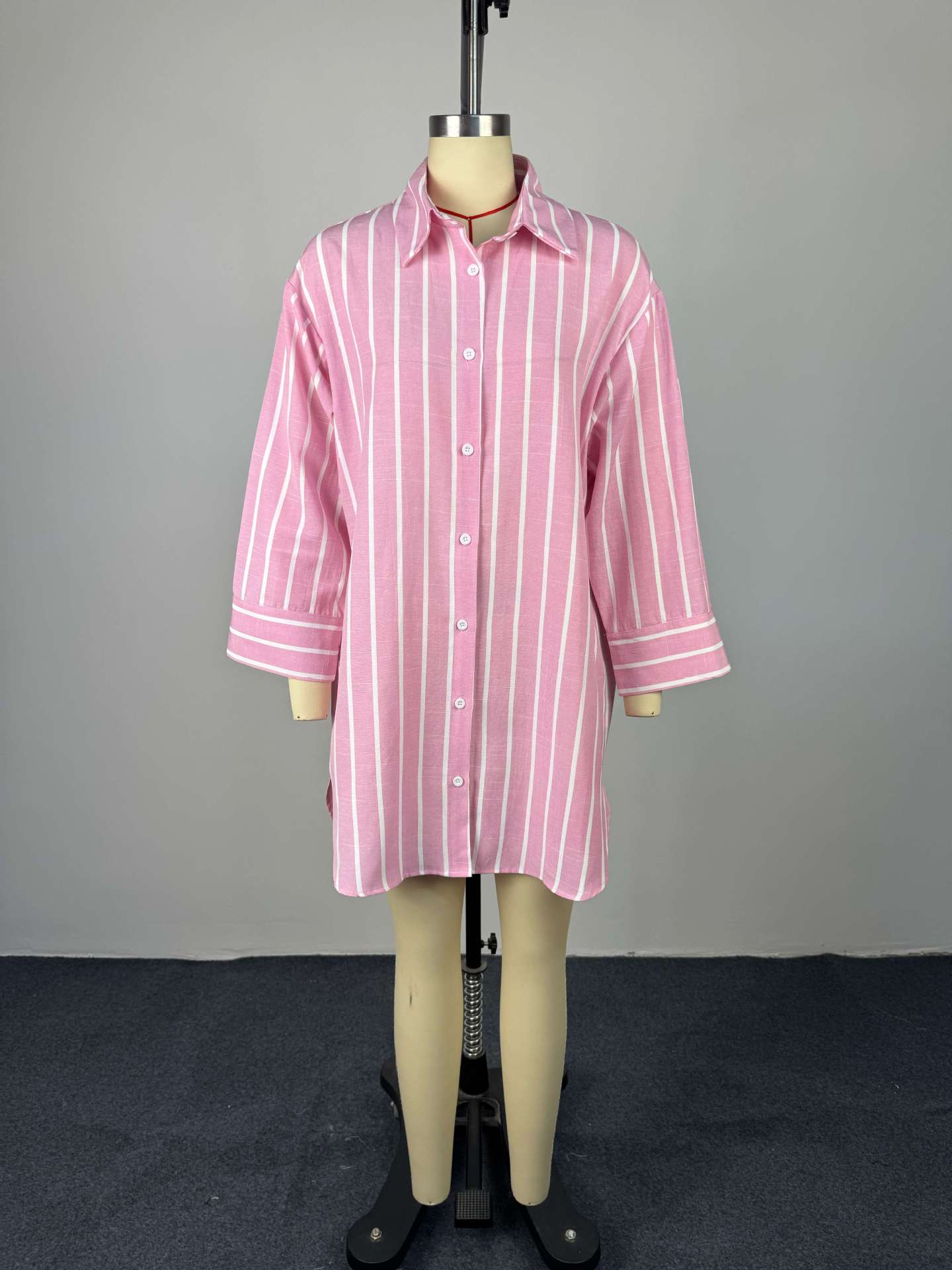 Collar breasted loose striped long sleeved mid length shirt for women