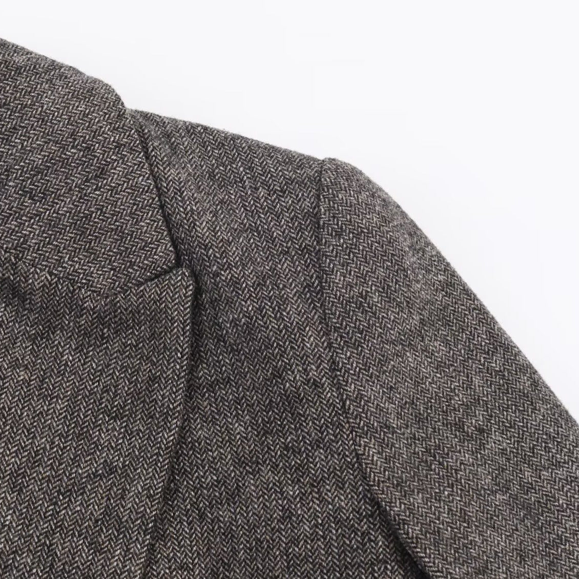 Commuter style herringbone patterned suit jacket