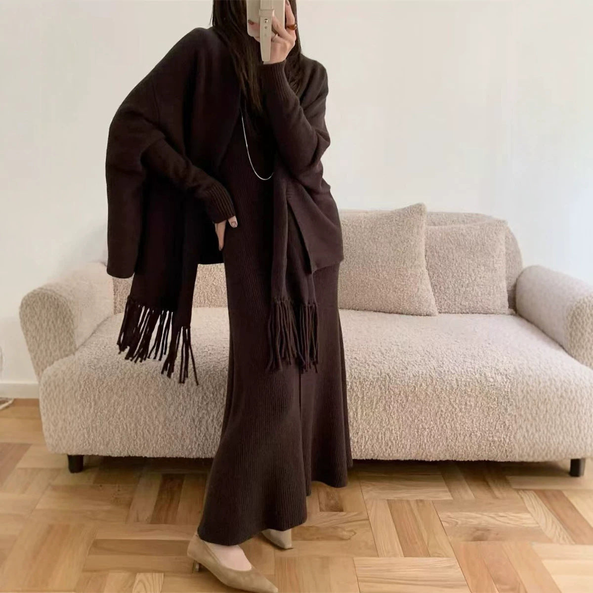 Wear a sleeveless high neck slim fitting jumpsuit long dress