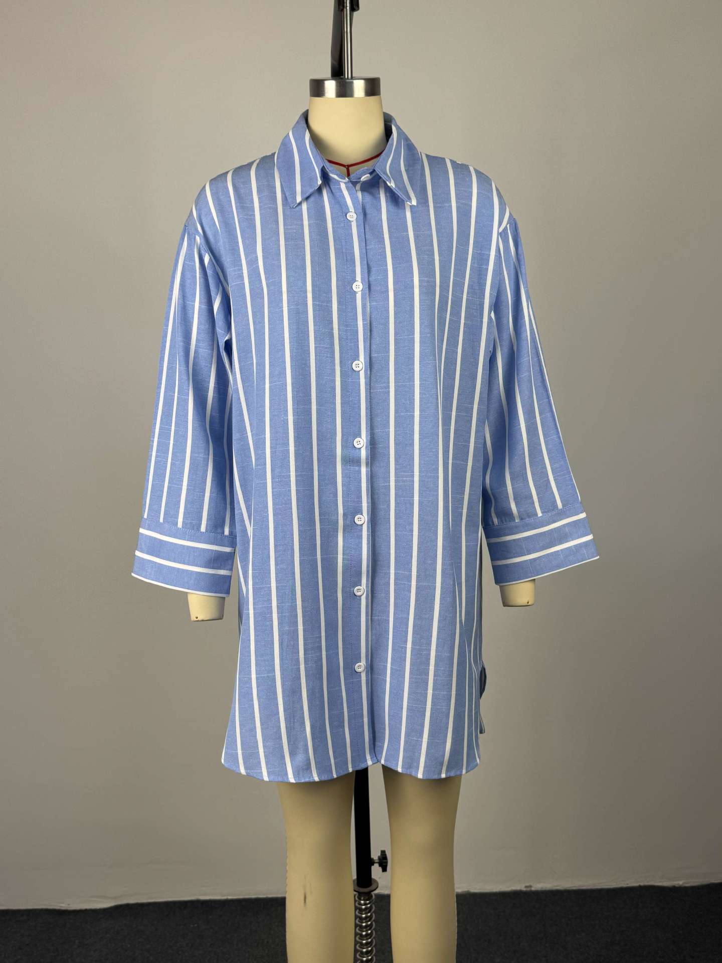 Collar breasted loose striped long sleeved mid length shirt for women