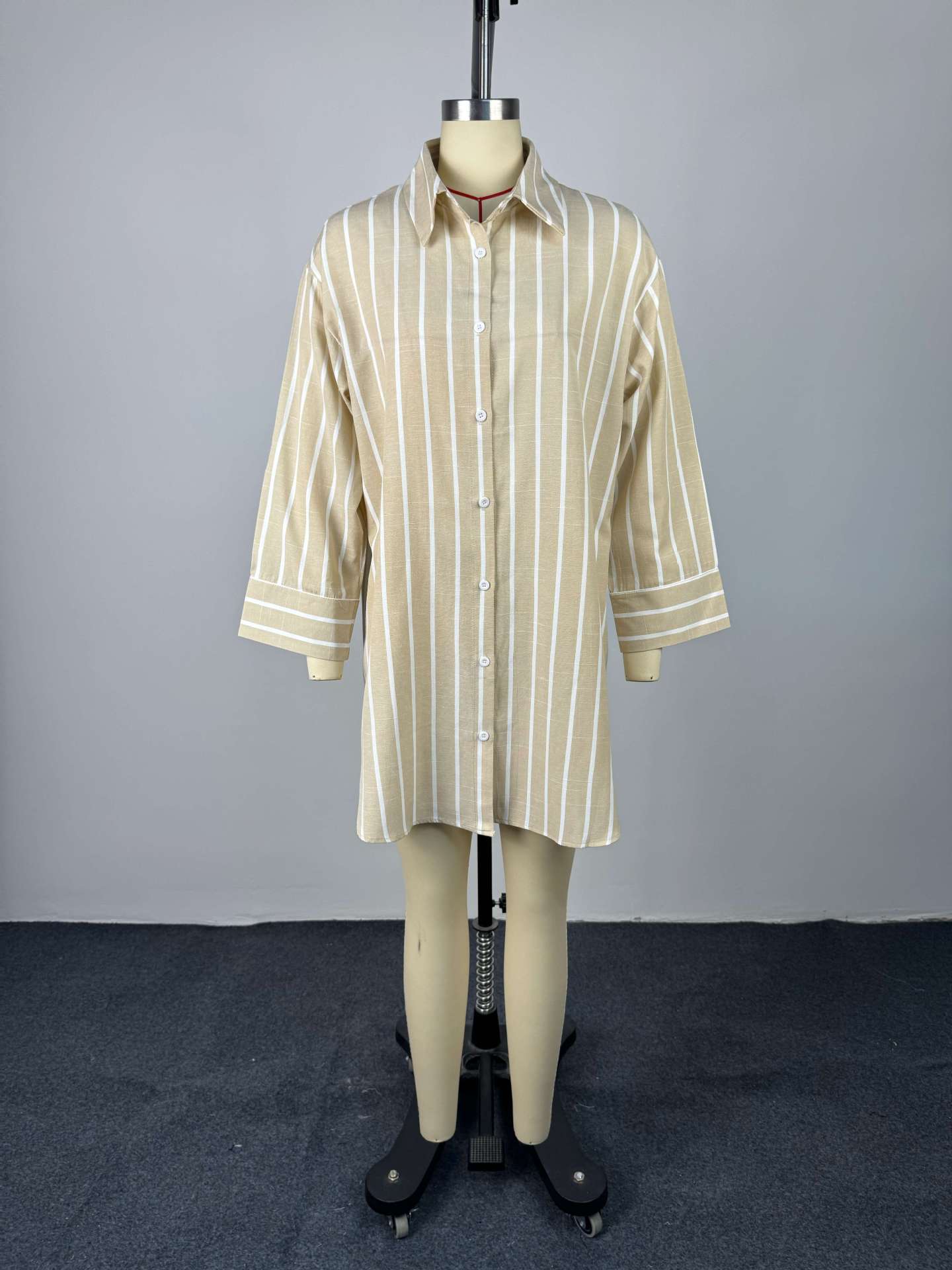 Collar breasted loose striped long sleeved mid length shirt for women