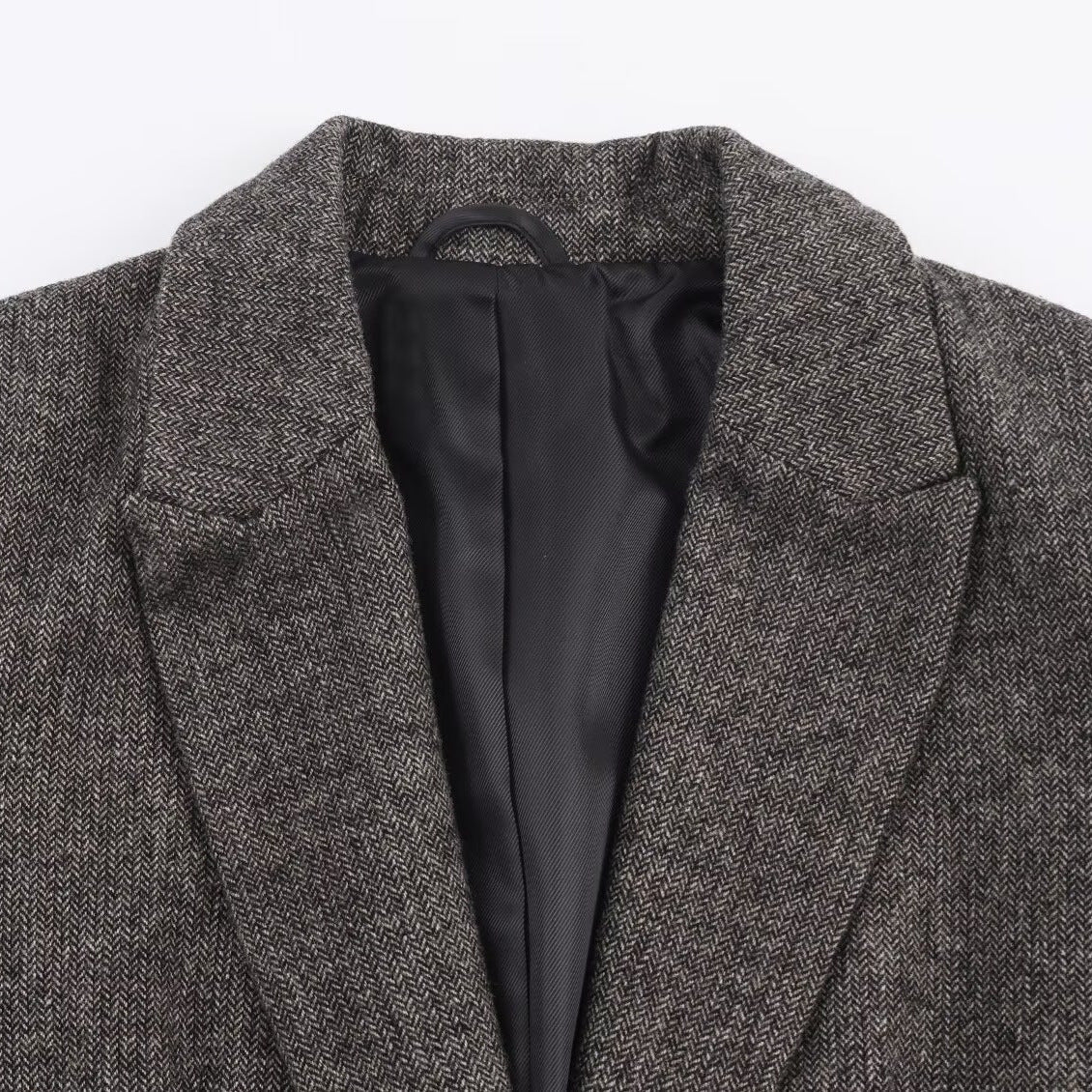 Commuter style herringbone patterned suit jacket